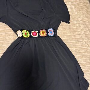Elegant Black Dress with Colorful Accents